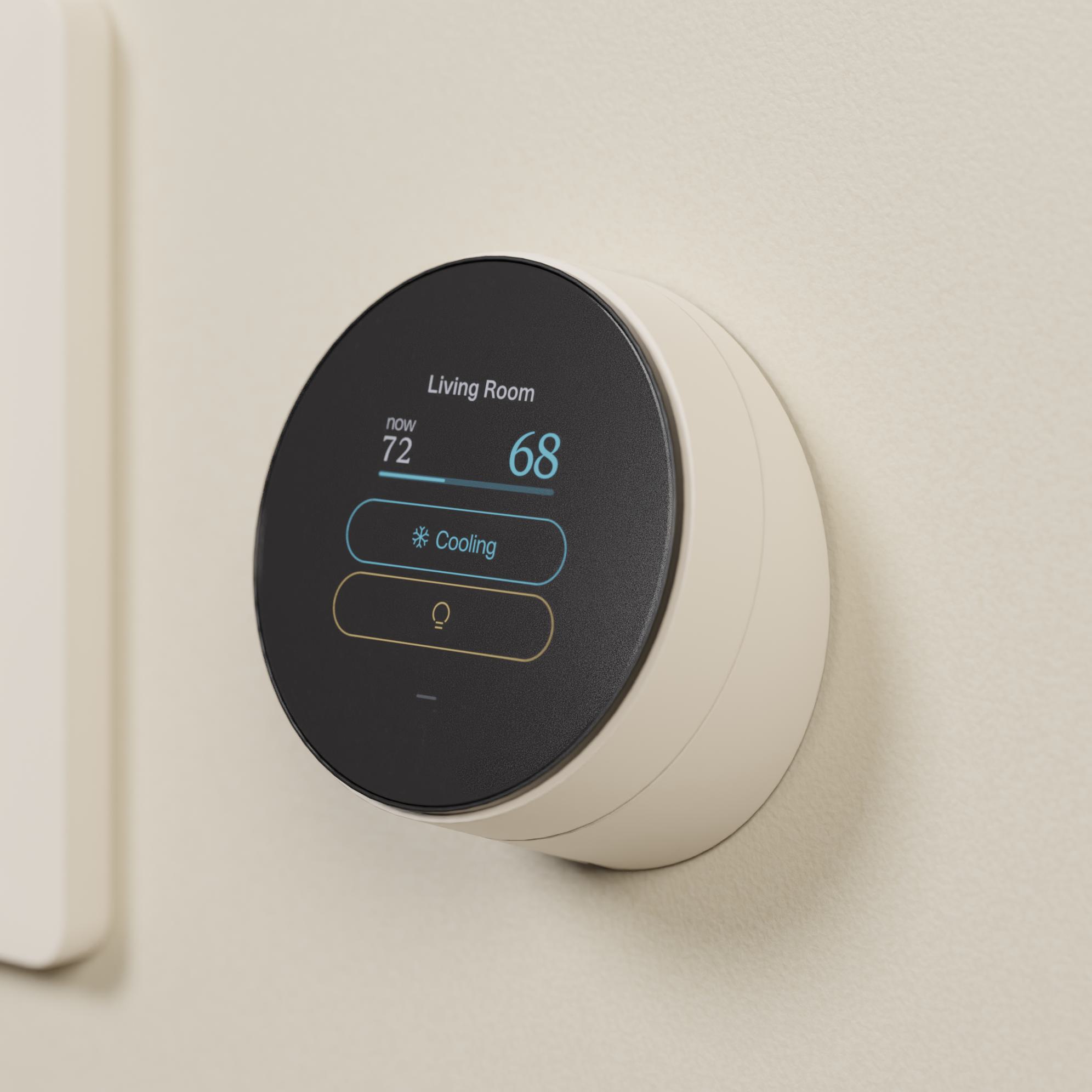 Quilt Dial mounted on a white wall next to a light switch.